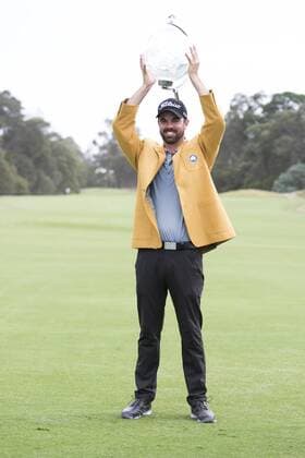 November 23, 2014: Nick Cullen during the trophy presentation wearing the golden jacket holds up the trophy during the final round of the Australian Golf Masters at Metropolitan Golf Club, Melbourne Victoria Australia GOLF: NOV 23 Australian Masters - Final Round Icon14112365 EDITORIAL USE ONLY