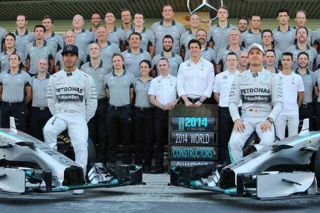 23.11.2014- Lewis Hamilton (GBR) Mercedes AMG F1 W05 and Nico Rosberg (GER) Mercedes AMG F1 W05 in the team photo Abu Dhabi Grand Prix, UAE 20 - 23 November 2014 