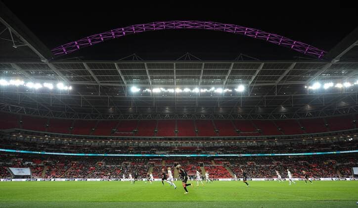 The Famous Floodlit pink Arch at Wembley Stadium during the 2nd half of the game - Womens International Football - England vs Germany - Wembley Stadium - London, England - 23rdNovember 2014 - EDITORIAL USE ONLY. No use with unauthorised audio, video, data, fixture lists, club league logos or live services. Online in-match use limited to 120 images, no video emulation. No use in betting, games or single club league player publications.
