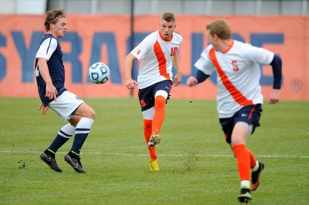 November 23, 2014: Syracuse Orange midfielder Julian Buescher (10) makes a pass up field during the first half of a 2014 NCAA College League USA Men s Soccer Tournament second round match between the Penn State Nittany Lions and the Syracuse Orange at the SU Soccer Stadium in Syracuse, New York. Syracuse defeated Penn State 2-1. Rich Barnes CSM NCAA College League USA Soccer 2014: Penn State vs Syracuse NOV 23 - ZUMAc04_
