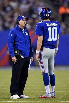 November 23, 2014: New York Giants head coach Tom Coughlin and New York Giants quarterback Eli Manning (10) during the second half of a NFL American Football Herren USA game between the Dallas Cowboys and New York Giants at MetLife Stadium in East Rutherford, NJ The Cowboys defeated the Giants 31-28. NFL American Football Herren USA NOV 23 Cowboys at Giants Icon781141123054 EDITORIAL USE ONLY