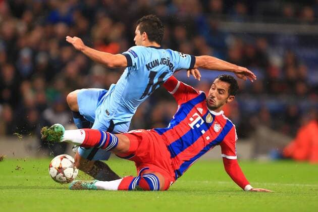 Mehdi Benatia of Munich brings down Sergio Kun Aguero of Manchester City to earn a red card - Manchester City vs. Bayern Munich - UEFA Champion s League - Etihad Stadium - Manchester - 25 11 2014 Pic Philip Oldham Sportimage EDITORIAL USE ONLY. No use with unauthorised audio, video, data, fixture lists, club league logos or live services. Online in-match use limited to 120 images, no video emulation. No use in betting, games or single club league player publications.