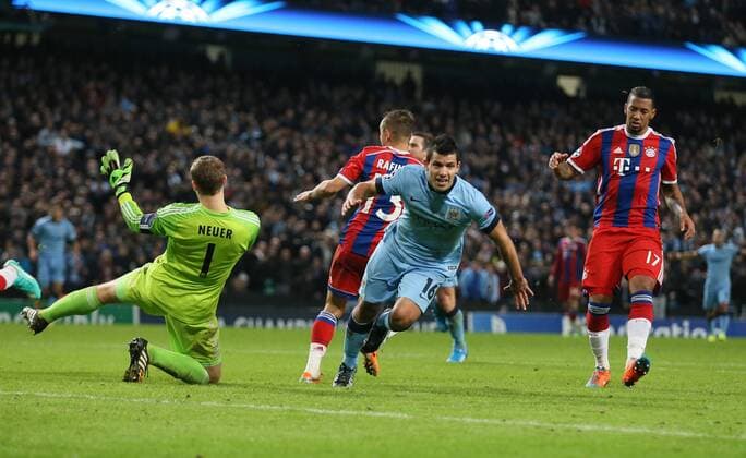 Sergio Kun Aguero of Manchester City turns to celebrate his winning goal - UEFA Champions League group E - Manchester City vs Bayern Munich - Etihad Stadium - Manchester - England - 25rd November 2014 - Picture Simon Bellis Sportimage EDITORIAL USE ONLY. No use with unauthorised audio, video, data, fixture lists, club league logos or live services. Online in-match use limited to 120 images, no video emulation. No use in betting, games or single club league player publications.
