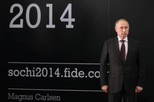 SOCHI, RUSSIA.NOVEMBER 25, 2014. Russia s president Vladimir Putin looks on at an awarding ceremony for the FIDE World Chess Championship 2014.  premiumd RE155C98