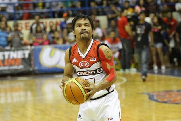 Nov. 26, 2014 - Antipolo Rizal, Philippines - Antipolo Rizal, Philippines - Manny Pacquiao head coach of KIA Sorento eyes the basket during his team s warm up in Antipolo Rizal on November 26, 2013. The eight-division world champion and politician did not play in their 88-77 loss against Purefoods Star Hotshots. Manny Pacquaio returns to basketball  - ZUMAn230