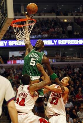 April 1, 2008 - Chicago Bulls Tyrus Thomas and Joakim Noah try in vain to stop the Boston Celtics Kevin Garnett from two points during the second quarter at the United Center in Chicago, Illinois, Tuesday, April 1, 2008. The Celtics defeated the Bulls, 106-92. (Nuccio DiNuzzo Chicago Tribune MCT) News Archive - April 1, 2008 - ZUMAm67_