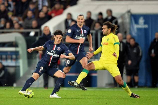 Aktuell Fußball, Frankreich, Ligue 1, Paris St. Germain - FC Nantes Edinson Cavani (psg) - Oswaldo Vizcarrondo (nan) FOOTBALL : Paris St Germain (PSG) vs FC Nantes - Ligue 1 - 06 12 2014 AnthonyBIBARDFEP 
