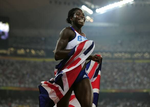 Großbritannien, Black History Month im Oktober - Sport Aug. 19, 2008 - Christine Ohuruogu of Great Britain celebrates winning gold in the 400 meters on Tuesday, August 19, 2008, in the Games of the the XXIX Olympiad in Beijing, China. (David Eulitt Kansas City Star MCT) News Archive - Aug. 19, 2008 - ZUMAm67_