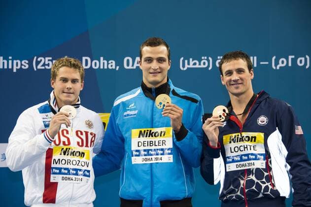 DEIBLER Markus GER Gold Medal WR CR MOROZOV Vladimir RUS Silver Medal LOCHTE Ryan USA Bronze Medal Men s 100m Individual Medley Final Doha Qatar 07-12-2014 Hamad Aquatic Centre, 12th FINA World Swimming Championships (25m). GiorgioxScala