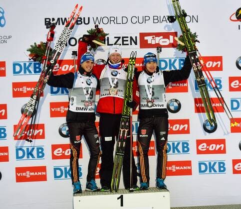 BIATHLON - IBU WC Hochfilzen HOCHFILZEN,AUSTRIA,12.DEZ.14 - BIATHLON, FLOWER CEREMONY - IBU World Cup, 10km sprint, men. Image shows Simon Schempp (GER), Johannes Thingnes Boe (NOR) and Andreas Birnbacher (GER). Keywords: award ceremony.