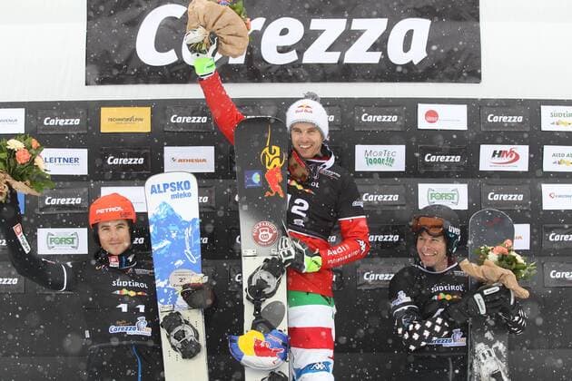 SNOWBOARD - FIS WC Carezza CAREZZA,ITALY,16.DEC.14 - SNOWBOARD - FIS World Cup, parallel giant slalom, men, award ceremony. Image shows Zan Kosir (SLO), Roland Fischnaller (ITA) and Jasey Jay Anderson (CAN). Keywords: trophy.