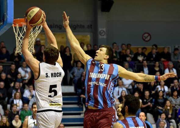 BASKETBALL - FIBA, Guessing vs Trabzonspor GUESSING,AUSTRIA,16.DEC.14 - BASKETBALL - FIBA Euro Challenge,Guessing Knights vs Trabzonspor Medical Park. Image shows Sebastian Koch (Guessing) and Andrija Stipanovic (Trabzonspor).