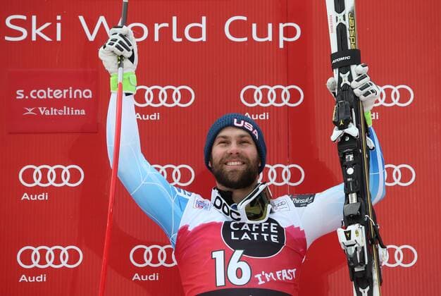 ALPINE SKIING - FIS WC Santa Caterina SANTA CATERINA,ITALY,28.DEC.14 - ALPINE SKIING - FIS World Cup, downhill men, award ceremony. Image shows the rejoicing of Travis Ganong (USA).