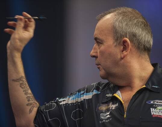 02.01.2014. London, England. PDC World Darts Championship. Quarter Final Round. Phil Taylor (2) ENG in action during his game . xStephenxBartholomewx  ActionPlus11586178