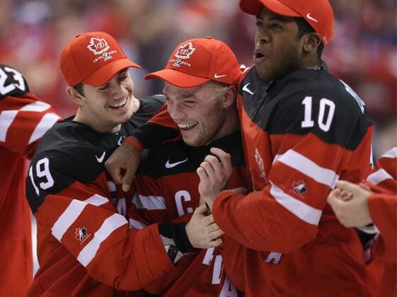 TORONTO, CANADA. JANUARY 5, 2015. Canada s Nic Petan, Max Domi, and Anthony Duclair (L-R) celebrate winning the 2015 IIHF World Junior Championship final Ice hockey Eishockey match against Russia at the Air Canada Centre. The Canadian team won the game 5:4. Yelena Rusko TASS  RE159374