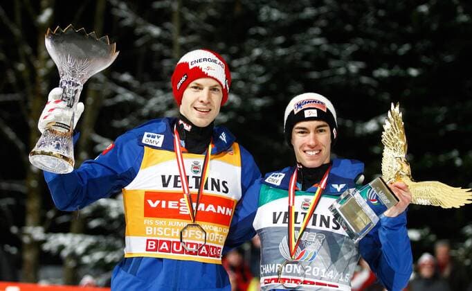 NORDIC SKIING - FIS WC Bischofshofen, Four Hills Tournament BISCHOFSHOFEN,AUSTRIA,06.JAN.15 - NORDIC SKIING, Ski jumping Skispringen Ski nordisch - FIS World Cup, Four Hills Tournament, large hill, men. Image shows the rejoicing of Tagessieger Michael Hayboeck (Sieg) and Tourneesieger Stefan Kraft (Sieg, Tourneesieg) (AUT). Keywords: Four Hills Tournament Trophy.