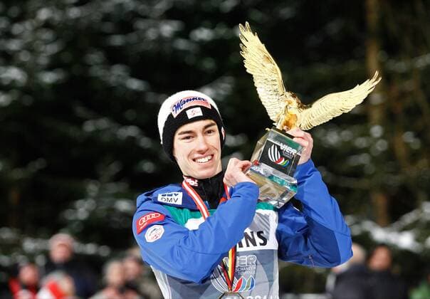 NORDIC SKIING - FIS WC Bischofshofen, Four Hills Tournament BISCHOFSHOFEN,AUSTRIA,06.JAN.15 - NORDIC SKIING, Ski jumping Skispringen Ski nordisch - FIS World Cup, Four Hills Tournament, large hill, men. Image shows the rejoicing of Tourneesieger Stefan Kraft (Sieg, Tourneesieg) (AUT). Keywords: Four Hills Tournament Trophy.