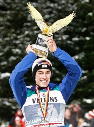 NORDIC SKIING - FIS WC Bischofshofen, Four Hills Tournament BISCHOFSHOFEN,AUSTRIA,06.JAN.15 - NORDIC SKIING, Ski jumping Skispringen Ski nordisch - FIS World Cup, Four Hills Tournament, large hill, men. Image shows the rejoicing of Tourneesieger Stefan Kraft (Sieg, Tourneesieg) (AUT). Keywords: Four Hills Tournament Trophy.
