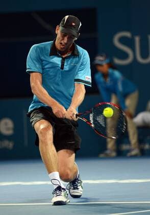 John Millman (AUS) in Aktion. Brisbane International 2015, Brisbane, Australien