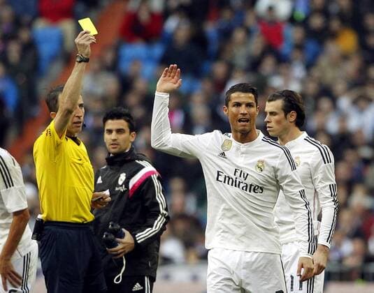 Liga BBVA match between Real Madrid and Espanyol Barcelona. In this picture, the referee David Fernandez Borbalan shows to Cristiano Ronaldo his first yellow card. xFOTOxCHEMAxREYx 