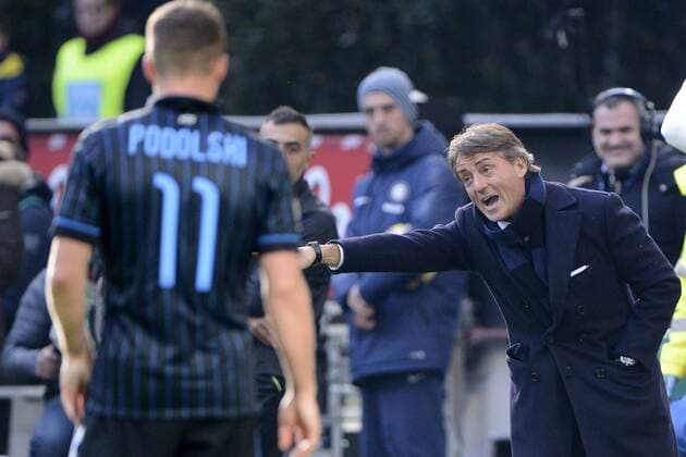 Roberto Mancini, Lukas Podolski Inter Milano 11-01-2015 Stadio Giuseppe Meazza - Football, Serie A Inter Mailand vs. Genoa CFC. giuseppexceleste