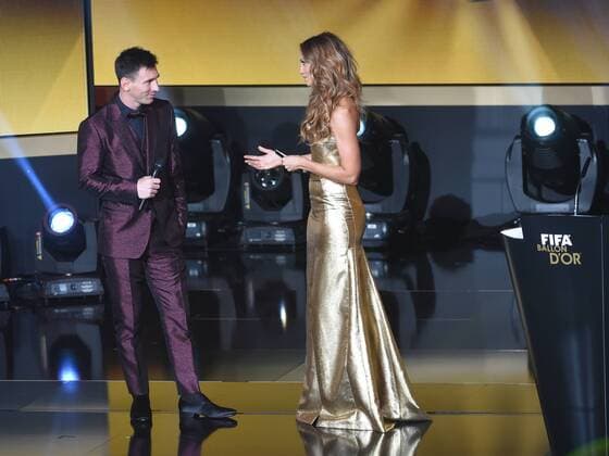 SOCCER - FIFA Ballon d Or 2014 ZURICH,SWITZERLAND,12.JAN.15 - SOCCER - FIFA World Player Gala, Ballon d Or 2014. Image shows Lionel Messi (ARG FC Barcelona Barca and host Kate Abdo.