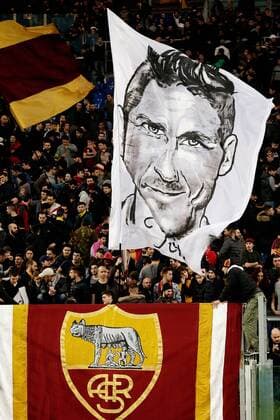 Fans of AS Roma with flag of Francesco Totti of AS Roma during the Serie A match on January 11,2014 at the Stadio Olimpico in Rome, Italy. Serie A 2014 2015 xVIxVIxIMAGESx xEricxVerhoevenxIVx 3423791