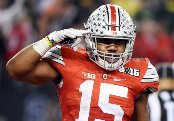 Ohio State Buckeyes Ezekiel Elliott celebrates after he runs for a 2 yard touchdown in the fourth quarter against the Oregon Ducks in the College Football Playoff National Championship, in Arlington, Texas on January 12, 2015.  DAL20150112120 IANxHALPERIN