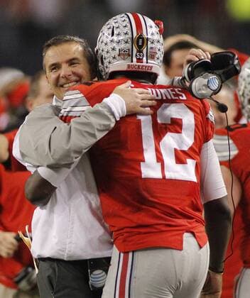 Jan. 12, 2015 - Arlington, TX, USA - Ohio State coach Urban Meyer and Ohio State Buckeyes quarterback Cardale Jones (12) celebrate as their game against Oregon ends on Monday, Jan. 12, 2015, at AT&T Stadium in Arlington, Texas. Ohio State defeated Oregon 42-20. CFP National Championship - ZUMAm67_