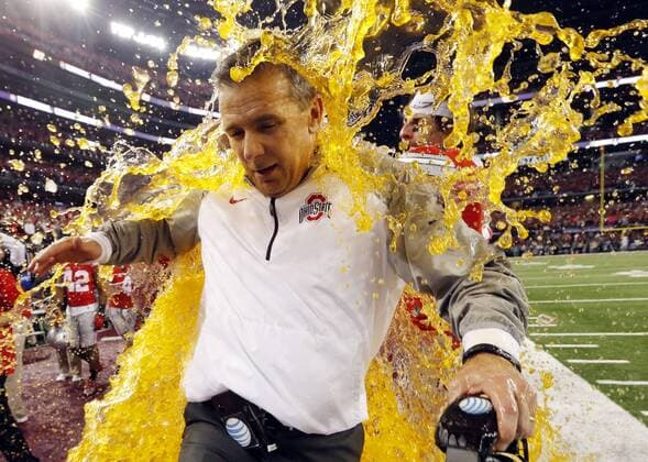 Jan. 12, 2015 - Arlington, Texas, U.S - Ohio State head coach Urban Meyer is dunked during the NCAA College League USA college football playoff championship game against Oregon Monday, January 12, 2015, in Arlington, Texas. Ohio State won 42-20. National Championship - Oregon v Ohio State - ZUMAp124