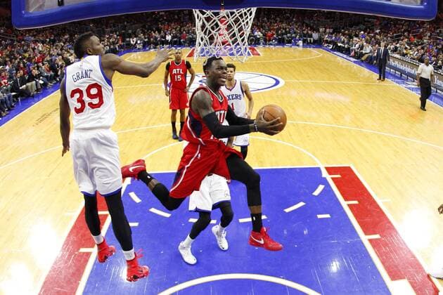 January 13, 2015: Atlanta Hawks guard Dennis Schroder (17) goes up for the shot as he gets past Philadelphia 76ers forward Jerami Grant (39) during the NBA Basketball Herren USA game between the Atlanta Hawks and the Philadelphia 76ers at the Wells Fargo Center in Philadelphia, Pennsylvania. The Atlanta Hawks won 105-87. NBA 2015: Hawks vs 76ers JAN 13 - ZUMAcs7_