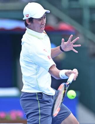 Jan. 14, 2015 - Melbourne, Victoria, Australia - Key Nishikori of Japan in action on day two of the Kooyong Classic tennis tournament at the Kooyong Lawn Tennis Club, Melbourne, Australia. Tennis 2015 - Kooyong Classic - - ZUMAk106