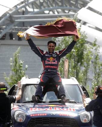 Aktuell Rallye Dakar - Siegerehrung in Buenos Aires 17-jan-2015 Qatari pilot Nasser Al-Attiyah celebrates after winng champion of the cars category in the Dakar Rally 2015 at the Tecnopolis Center in in Buenos Aires, capital of Argentina, on Jan. 17, 2015. Alberto Raggio) (SP)ARGENTINA-BUENOS AIRES-RACING-DAKAR e ALBERTOxRAGGIO 