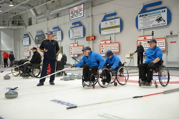 Team Canada s Gerry Austgarden (C), Gary Cormack (R) and Samantha Siu compete during the 2015 BC Wheelchair Curling Championship in Richmond, BC, Canada, Jan.17, 2015. A 3-day championship will see Canada s top curlers battle for the trophy. ) (SP)CANADA-RICHIMOND-CURLING SergeixBachlakov 
