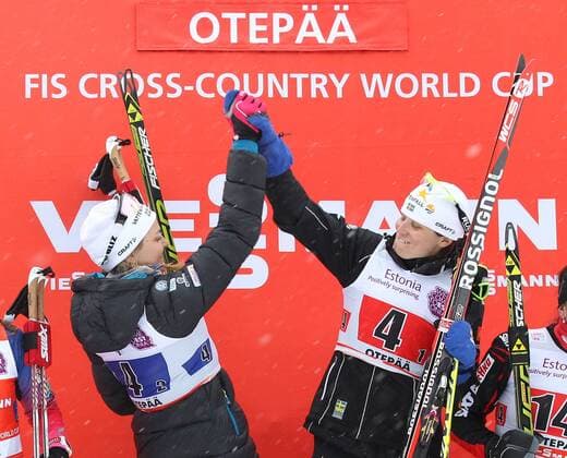 NORDIC SKIING - FIS WC Otepaeae OTEPAEAE,ESTONIA,18.JAN.15 - NORDIC SKIING, CROSS COUNTRY SKIING - FIS World Cup, team sprint, ladies, award ceremony. Image shows Stina Nilsson and Ida Ingemarsdotter (SWE).