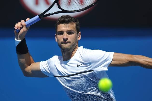 19.01.2015 Australian Open Tennis from Melbourne Park. Grigor Dimitrov of Bulgaria hits a shot in his match on day one of the 2015 Australian Open at Melbourne Park, Melbourne, Australia. xEssixLimx  ActionPlus11590736