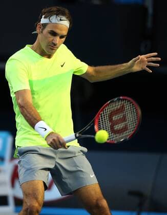 (150119) -- MELBOURNE, Jan. 19, 2015 -- Roger Federer of Switzerland returns the ball during the first round match of men s singles at the 2015 Australian Open tournament in Melbourne, Australia, Jan. 19, 2015. (SP)AUSTRALIA-MELBOURNE-TENNIS XuxYanyan 