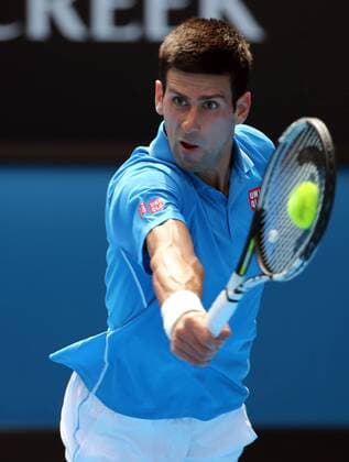 (150120) -- MELBOURNE, Jan. 20, 2015 -- Novak Djokovic of Serbia returns the ball during the first round match of men s singles at the 2015 Australian Open tennis tournament in Melbourne, Australia, Jan. 20, 2015. BaixXue 