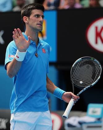 (150120) -- MELBOURNE, Jan. 20, 2015 -- Novak Djokovic of Serbia reacts during the first round match of men s singles at the 2015 Australian Open tennis tournament in Melbourne, Australia, Jan. 20, 2015. BaixXue 