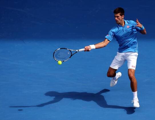 (150120) -- MELBOURNE, Jan. 20, 2015 -- Novak Djokovic of Serbia returns the ball during the first round match of men s singles at the 2015 Australian Open tennis tournament in Melbourne, Australia, Jan. 20, 2015. BaixXue 