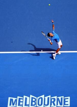 (150120) -- MELBOURNE, Jan. 20, 2015 -- Novak Djokovic of Serbia serves during the first round match of men s singles at the 2015 Australian Open tennis tournament in Melbourne, Australia, Jan. 20, 2015. BaixXue 