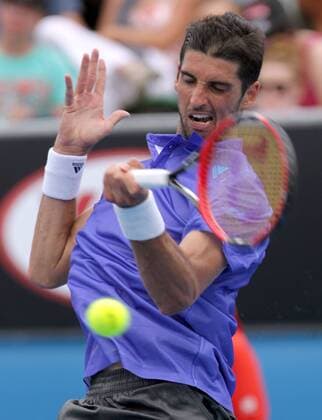 (150120) -- MELBOURNE, Jan. 20, 2015 -- Brazil s Thomaz Bellucci returns the ball during his men s singles first round match at the Australian Open tournament in Melbourne, Australia, Jan. 20, 2015. JinxLinpeng 