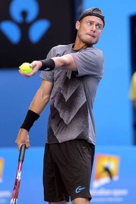 (150120) -- MELBOURNE, Jan. 20, 2015 -- Australia s Lleyton Hewitt serves the ball during his men s singles first round match at the Australian Open tournament in Melbourne, Australia, Jan. 20, 2015. JinxLinpeng 