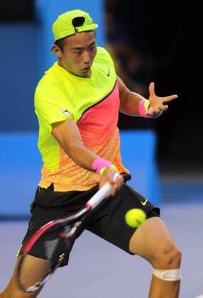 (150120) -- MELBOURNE, Jan. 20, 2015 -- China s Zhang Ze returns the ball during his men s singles first round match at the Australian Open tournament in Melbourne, Australia, Jan. 20, 2015. JinxLinpeng 