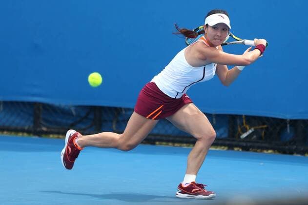 Zheng Jie of China prepares in the women s singles first round match of the 2015 Australian Open tennis tournament in Melbourne, Victoria, Australia, 20 January 2015.  20150120_26308