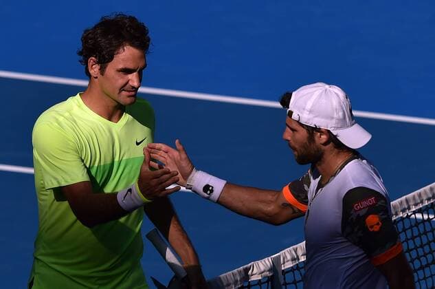 Jan. 21, 2015 - Melbourne, VICTORIA, AUSTRALIA - Switzerland s Roger Federer shakes hands with Italy s Simone Bolelli after their match on day 3 of the Australian Open tennis on RodLaver Arena in Melbourne, Australia. Tennis 2015 - Australian Open - Day 3 - ZUMAk106