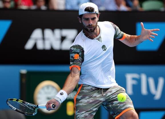 (150121) -- MELBOURNE, Jan. 21, 2015 -- Simone Bolelli of Italy returns the ball during his men s singles second round match at the Australian Open tournament in Melbourne, Australia, Jan. 21, 2015. XuxYanyan 