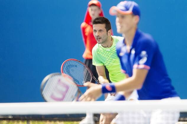 TENNIS - ATP Tennis Herren Australian Open 2015 MELBOURNE,AUSTRALIA,21.JAN.15 - TENNIS - ATP World Tour, Grand Slam, Australian Open, doubles. Image shows Julian Knowle (AUT) and Vasek Pospisil (CAN).