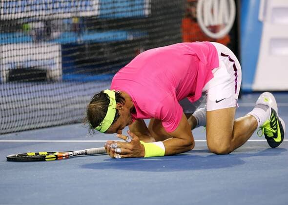 (150121) -- MELBOURNE, Jan. 21, 2015 -- Spain s Rafael Nadal celebrates after winning his men s singles second round on the third day of the 2015 Australian Open tennis tournament at Melbourne Park in Melbourne, Australia, Jan. 21, 2015. XuxYanyan 