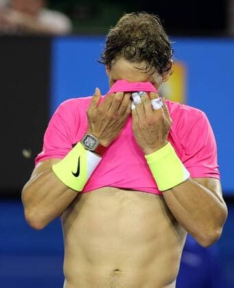 (150121) -- MELBOURNE, Jan. 21, 2015 -- Spain s Rafael Nadal reacts after winning his men s singles second round on the third day of the 2015 Australian Open tennis tournament at Melbourne Park in Melbourne, Australia, Jan. 21, 2015. XuxYanyan 